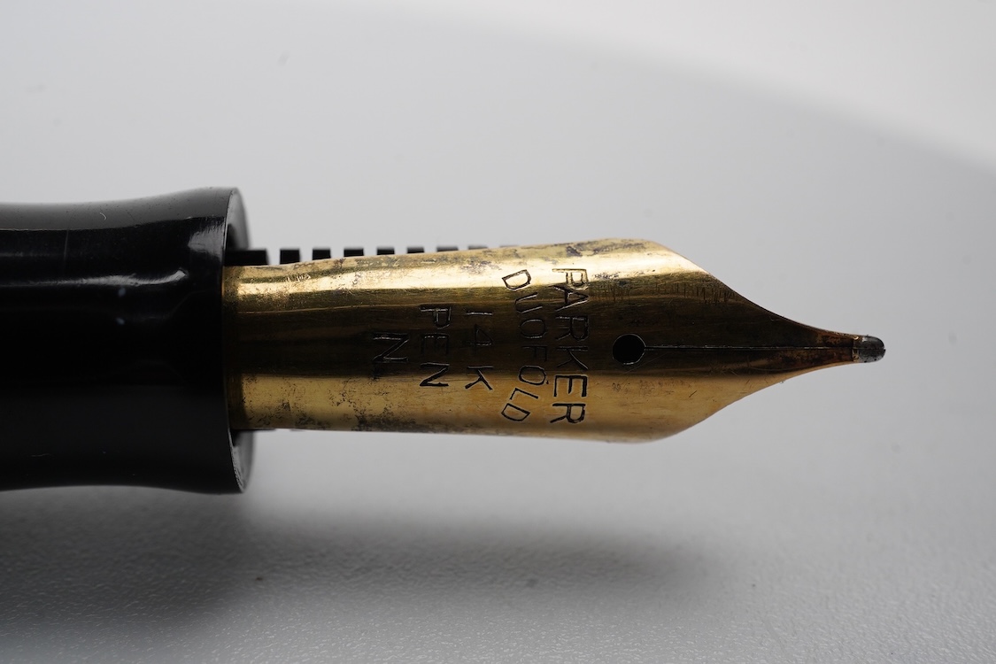 A Parker Senior UK Duofold 'red candy stripe' fountain pen with 14ct. gold 'N' nib